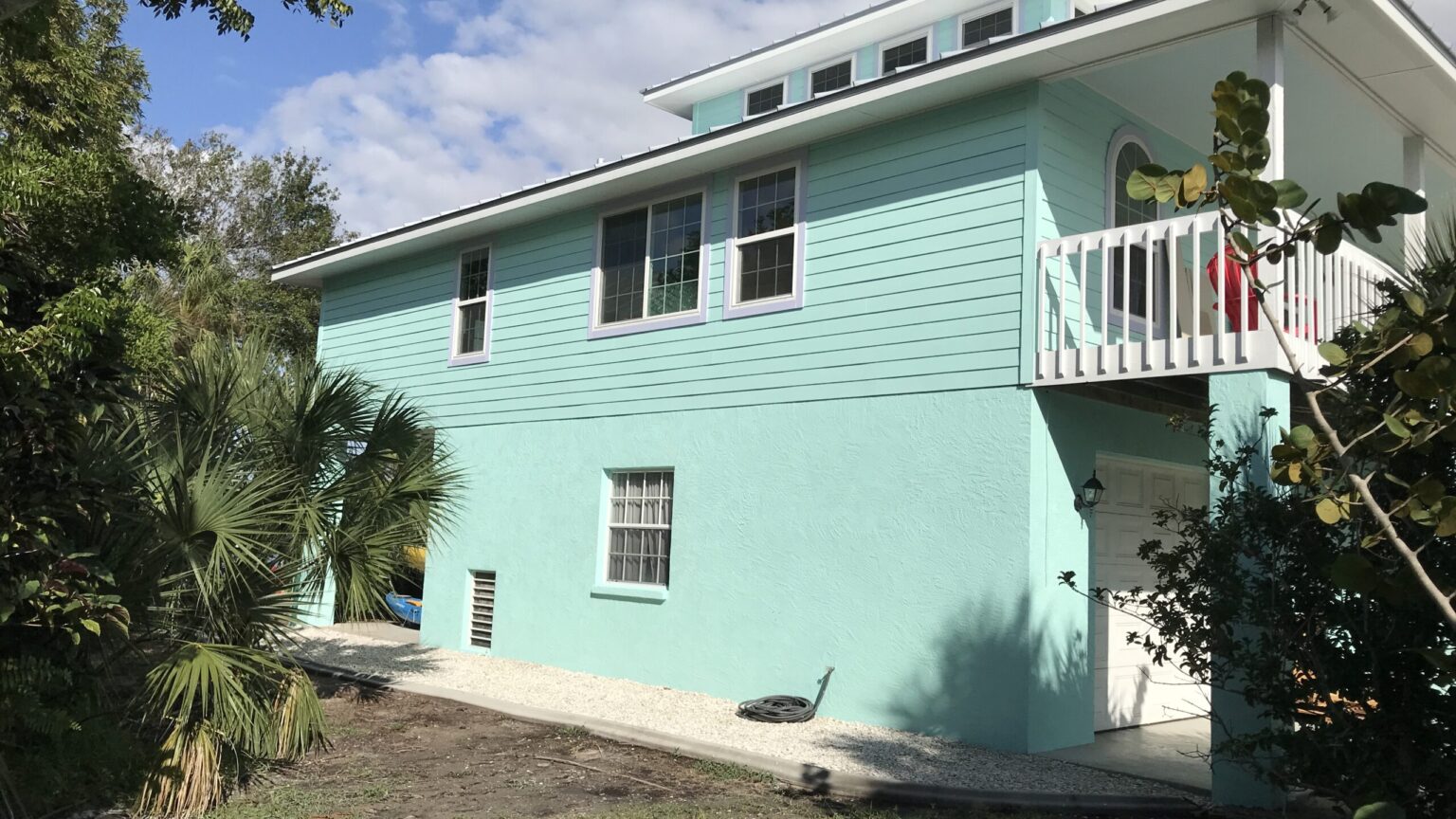 Two-story home exterior freshly painted by Speed Dry